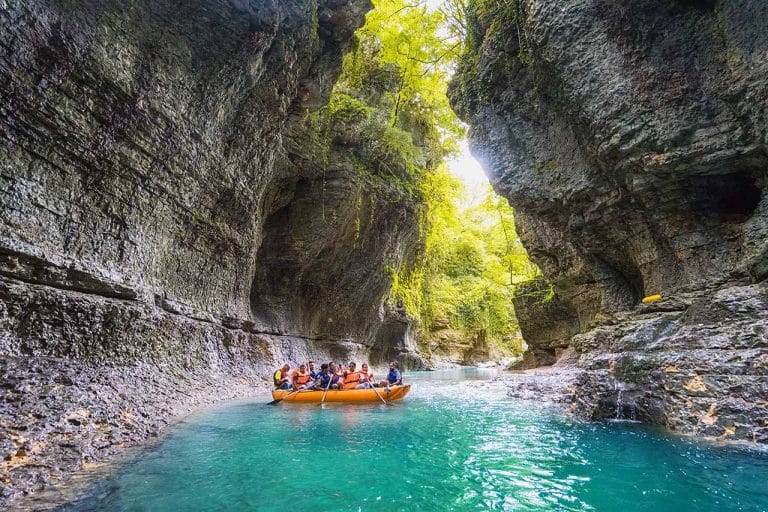 Boat with tourists in Martvili Canyon